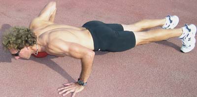 1-Hand Med Ball Push Up: Down Position